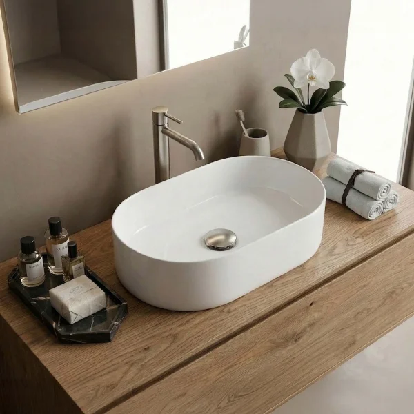 Lavabo bagno da appoggio 56x35cm a bacinella in ceramica bianco lucido Goccia
