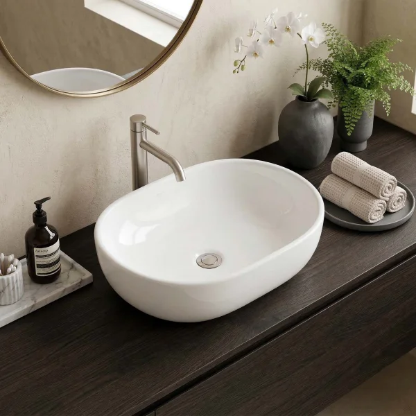 Lavabo bagno da appoggio ovale 60x41cm in ceramica bianco lucido Aqualite